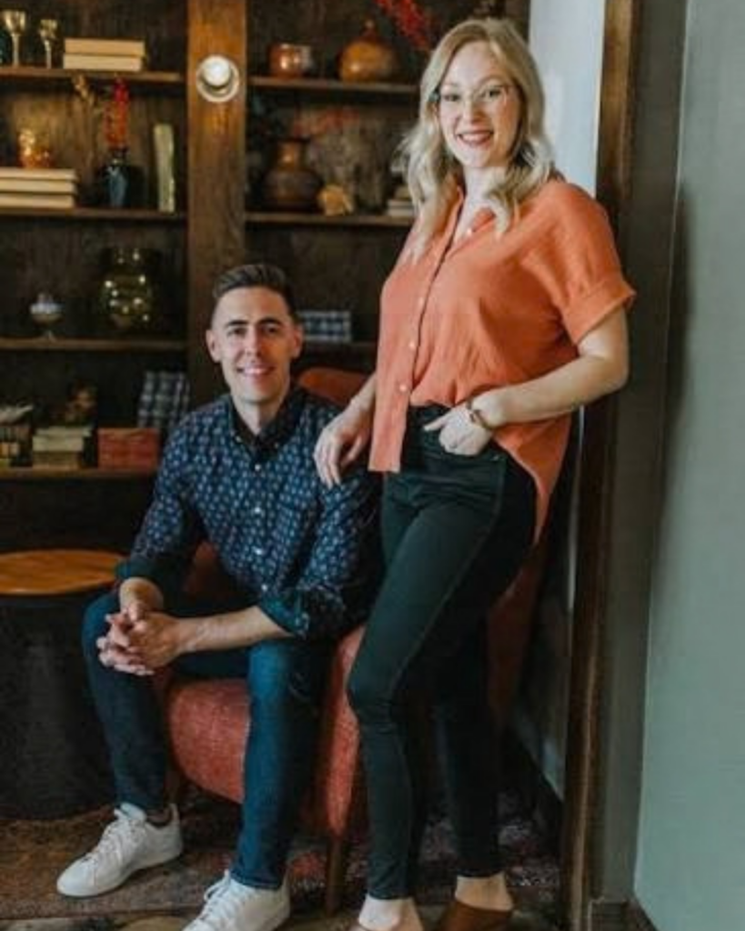 Angela and Tyler Wall posing together inside Dwell Studio Salon in Fort Worth, Texas.